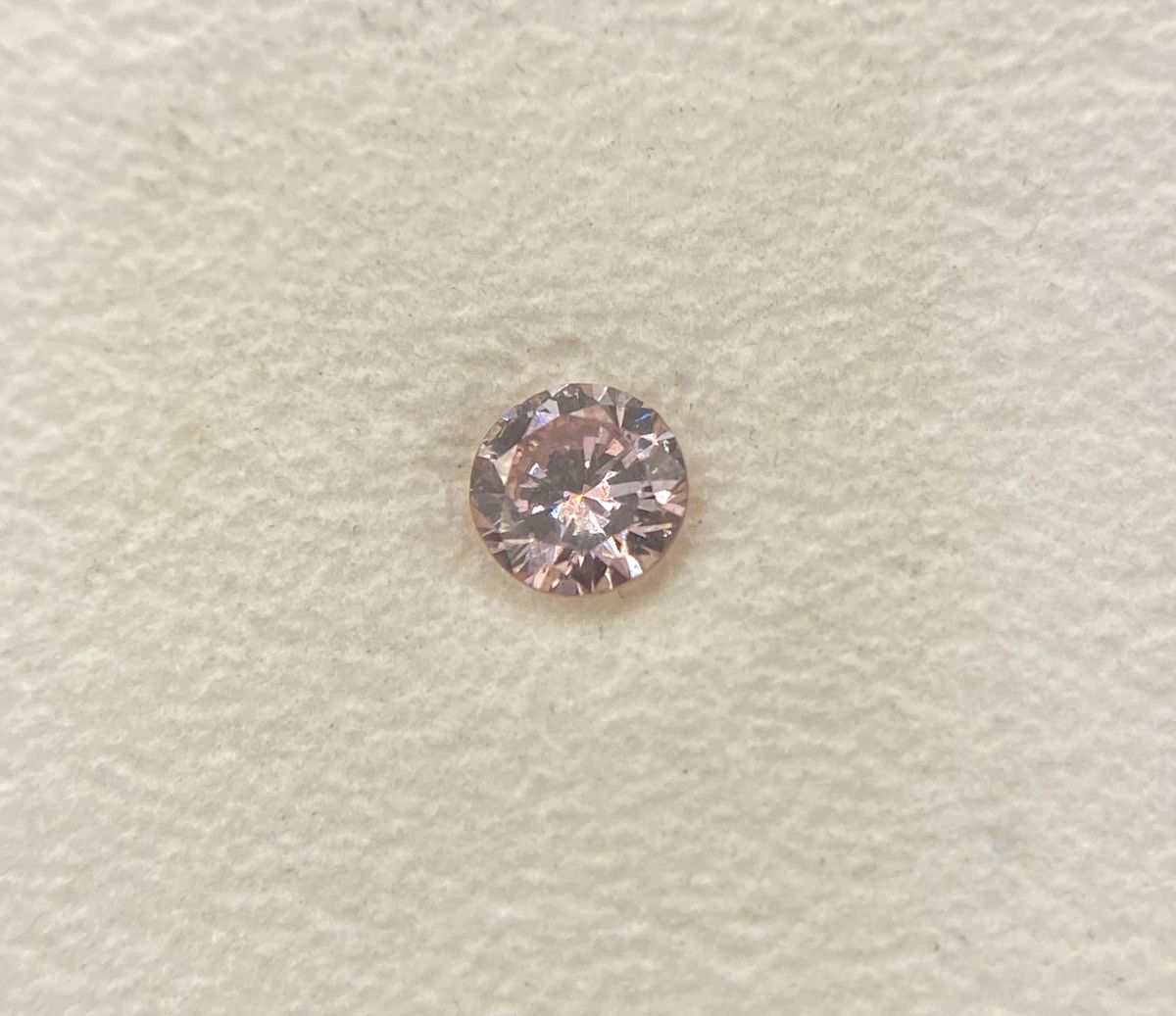 Fancy Brownish Pink Round .27 CT